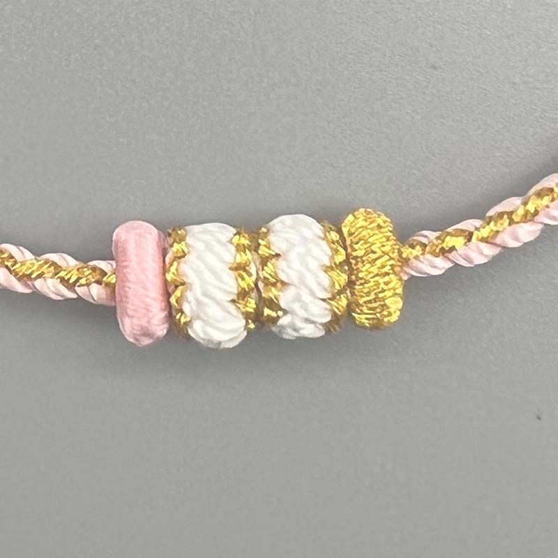 Second image of Pink-Gold Contrast Knit Bracelet