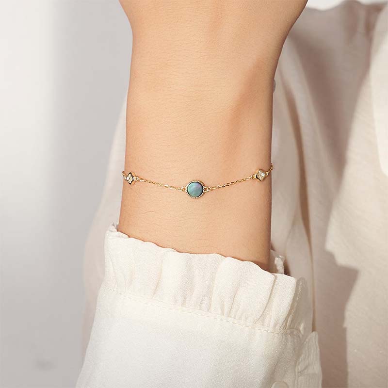 Second image of Gilded/Silver Four-Petal Flower Diamond-Accented Bracelet