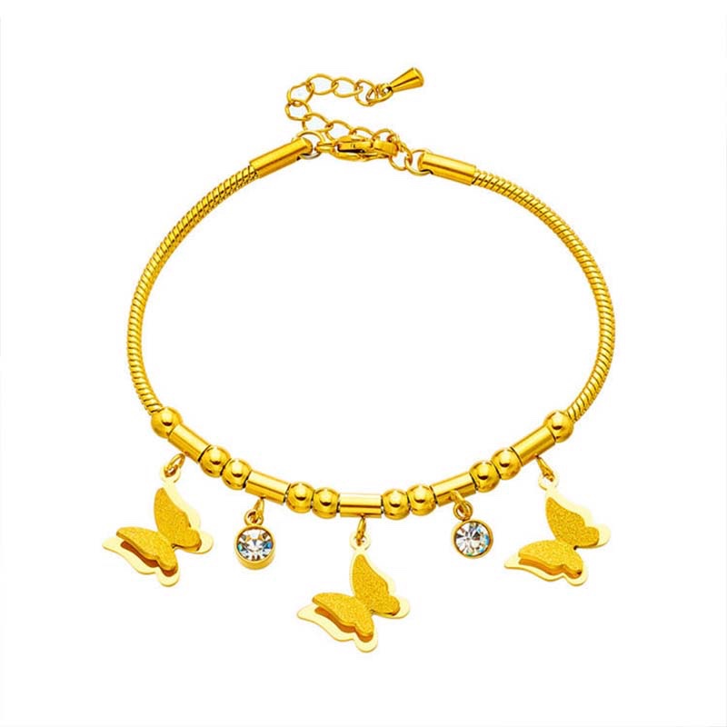 This is a gold butterfly pendant snake chain bracelet 
