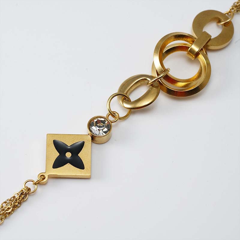 Second image of Golden Geometric Logo Bracelet