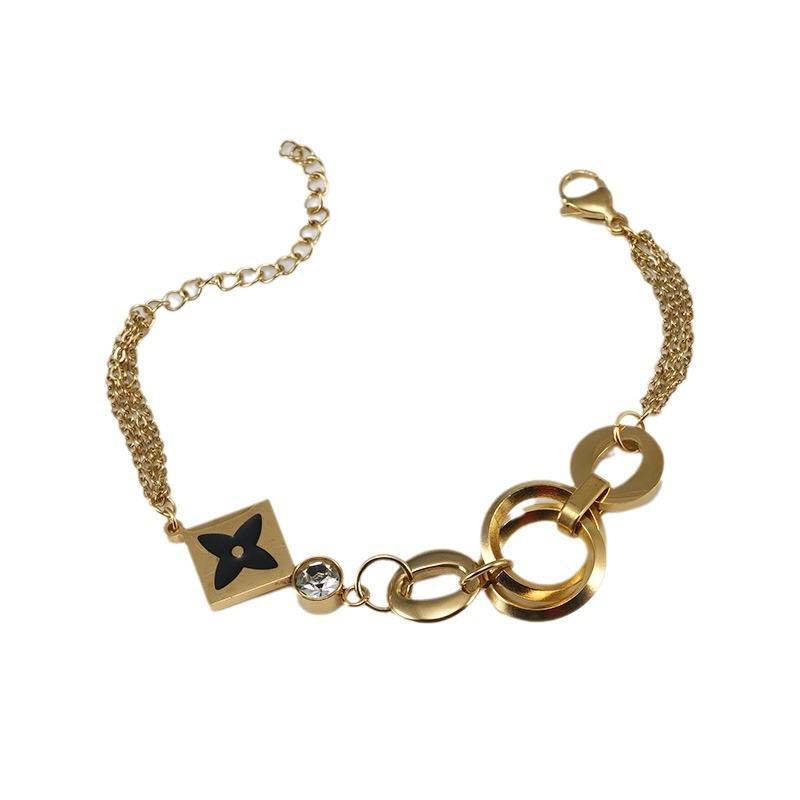 Golden Geometric Logo Bracelet