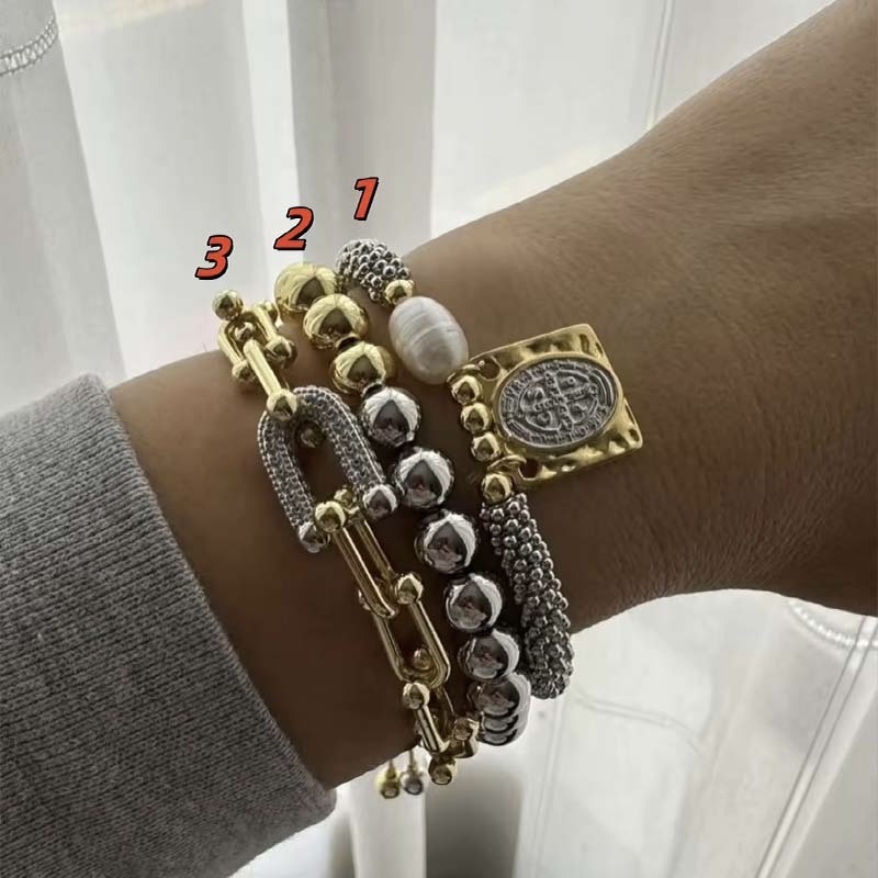 Second image of mixed-style metal layered bracelet set