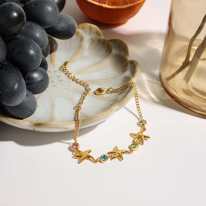 Second image of gold starfish colorful diamond bracelet