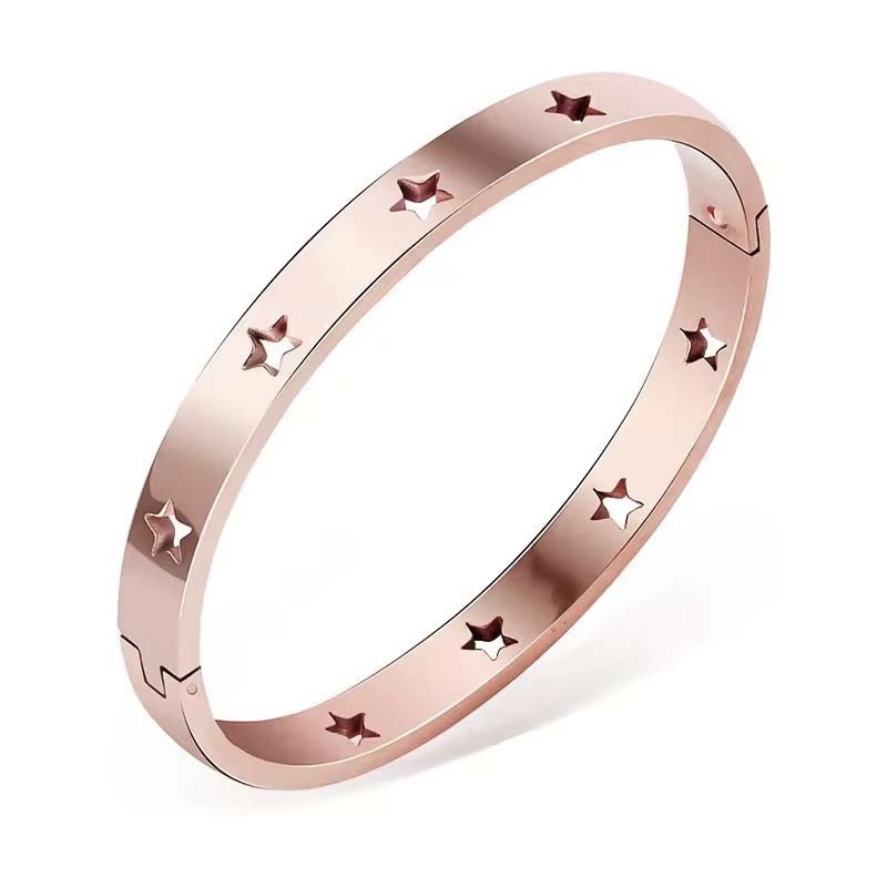 Second image of star-cutout thin-band clasp bangle