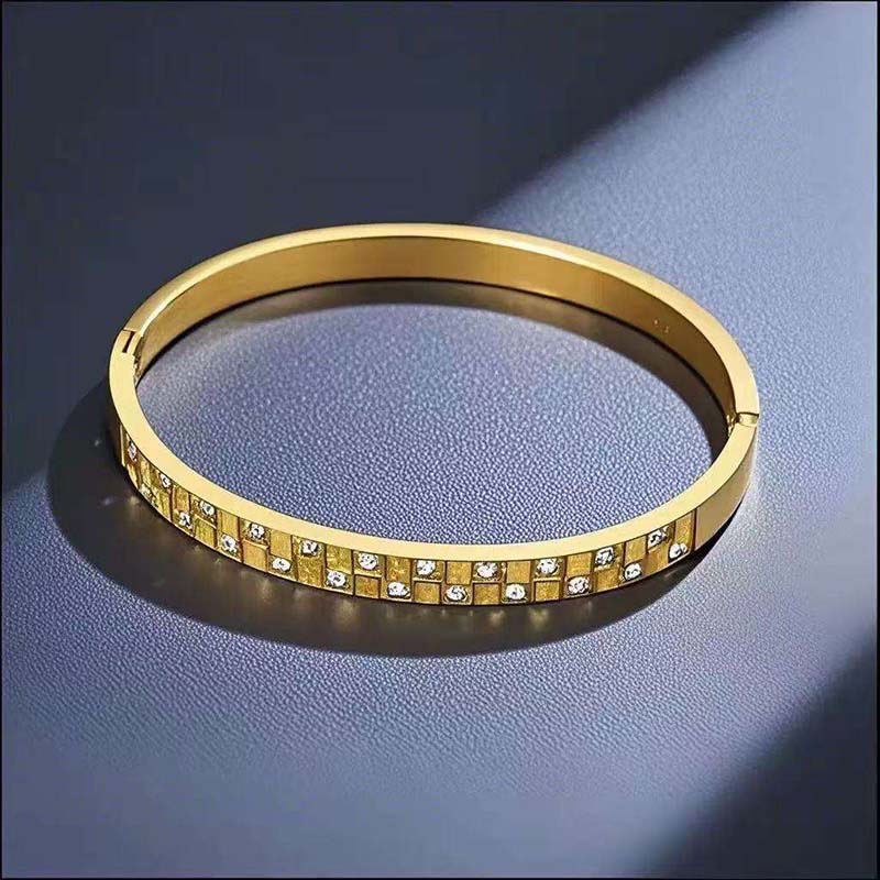 Second image of Gold-Tone Grid-Pattern CZ Bangle